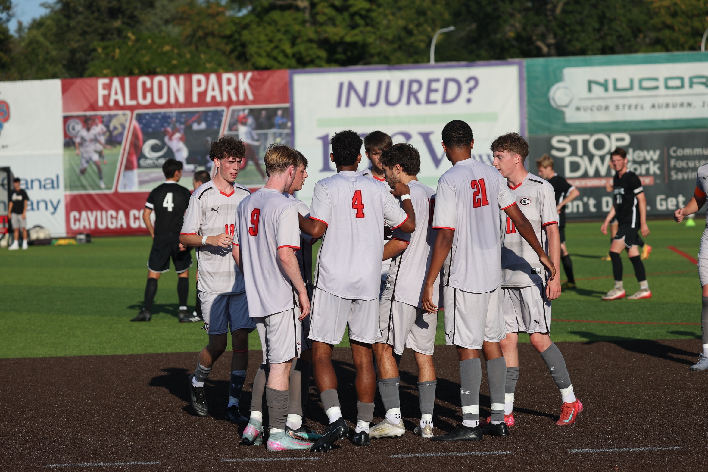 The Spartans celebrate after scoring a goal in an early-season match.