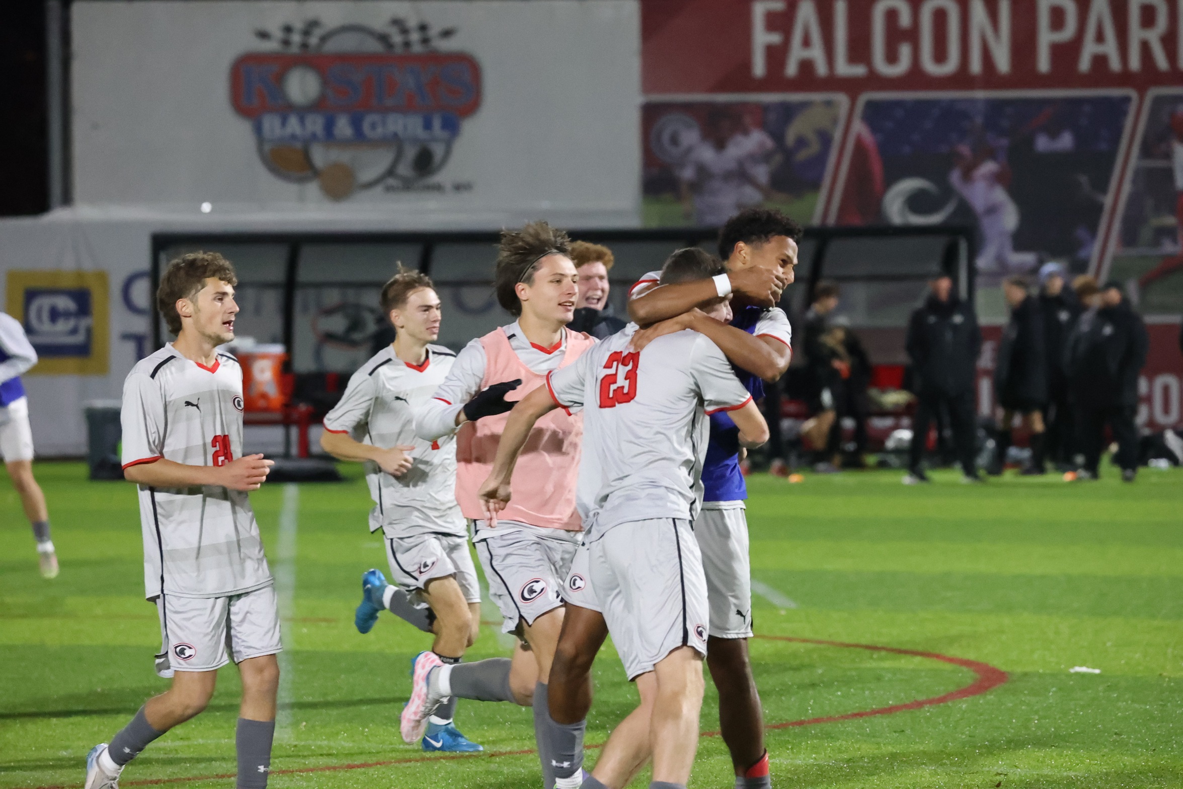 The Spartans celebrate after defeating Herkimer College 1-0 in the regional semifinal.