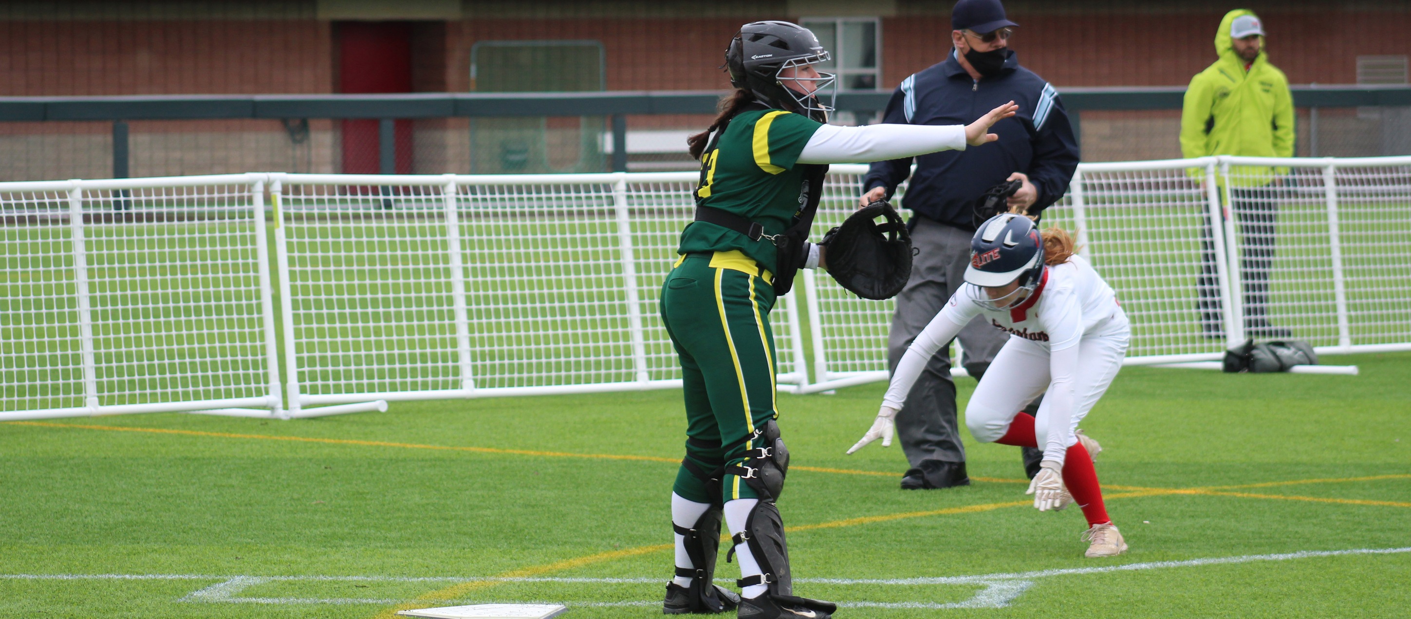 Cayuga leadoff hitter Gabriella Bard scores the first run of the Spartans' 18-17 win over SUNY Adirondack on Sunday, March 28. The Spartans scored seven runs in the final inning for the comeback win.