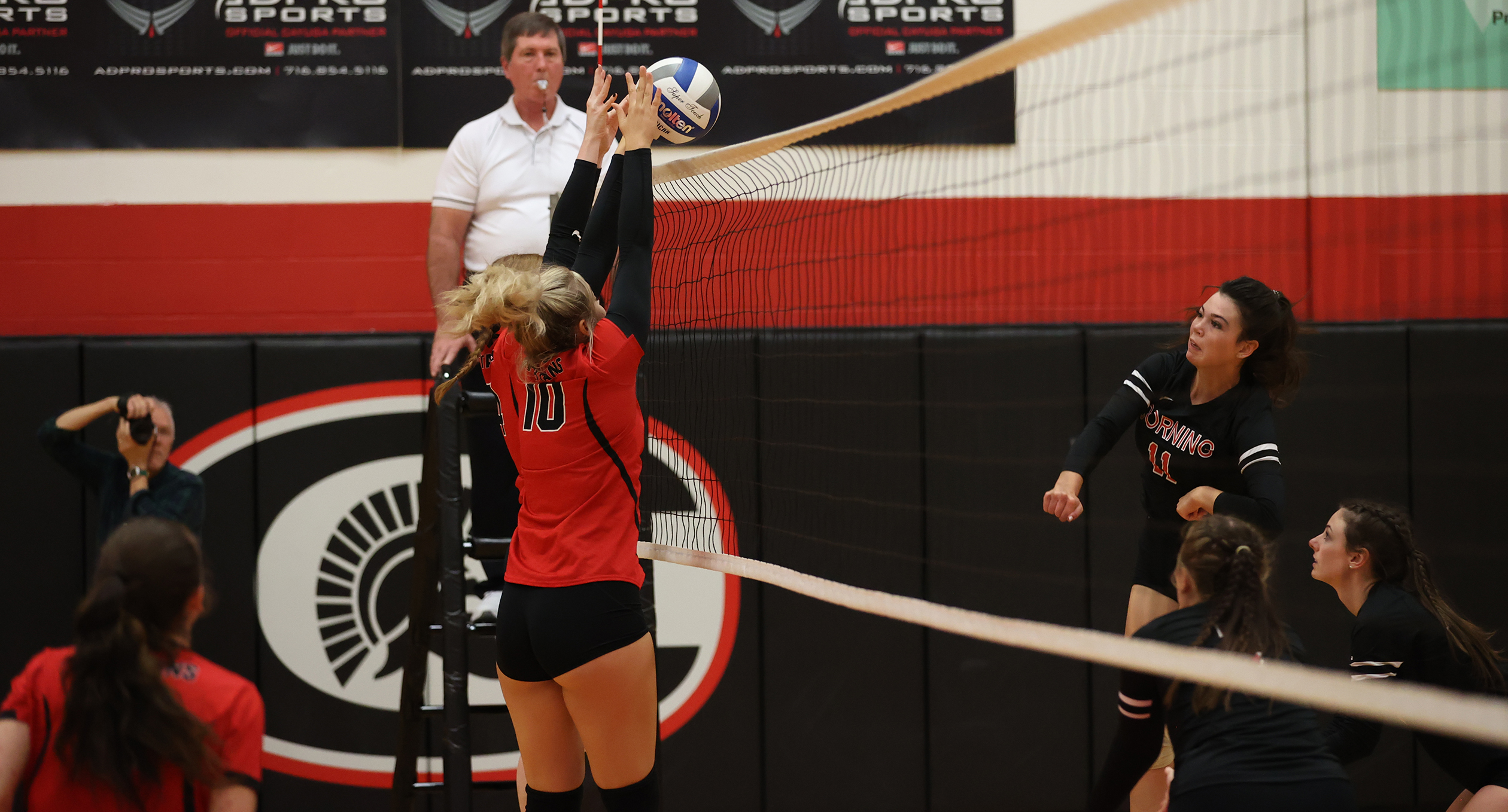 Cayuga's Volleyball team lost in straight sets to Corning on Thursday.